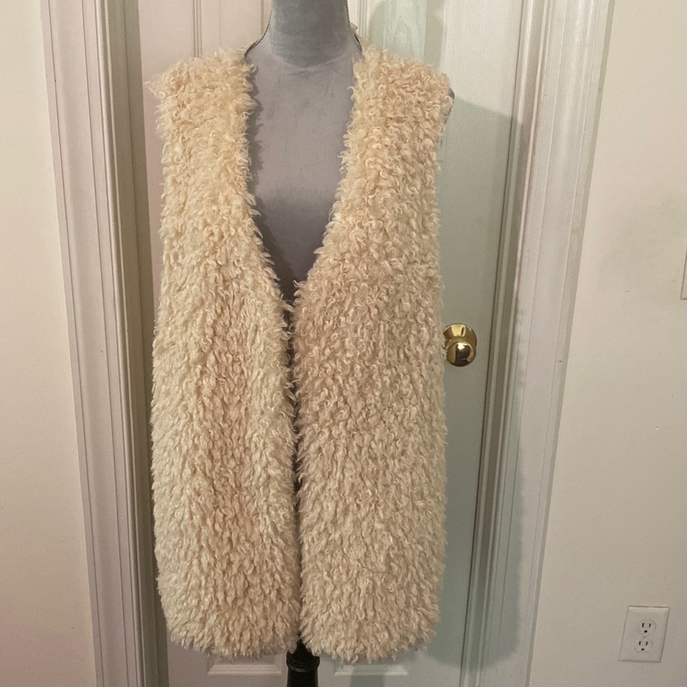 Gently worn sweater vest
